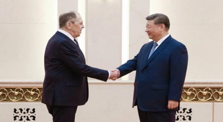 Canciller ruso y presidente chino afianzan preparativos para próxima visita de Putin a China